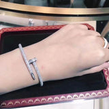Close-up detail view of Cartier unisex jewelry piece
