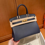 Side view of curated structured handbag
