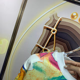 Back view of Louis Vuitton luxury clothing with signature branding