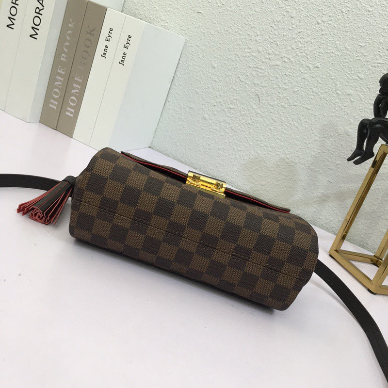 Styled lifestyle shot of refined elevated women's handbag – women's luxury handbag