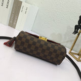Styled lifestyle shot of refined elevated women's handbag – women's luxury handbag