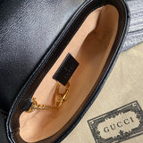 Front view of modern chic women's handbag – women's luxury accessory