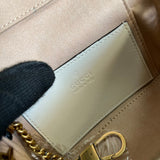 Close-up detail of polished sleek women's handbag – women's luxury accessory