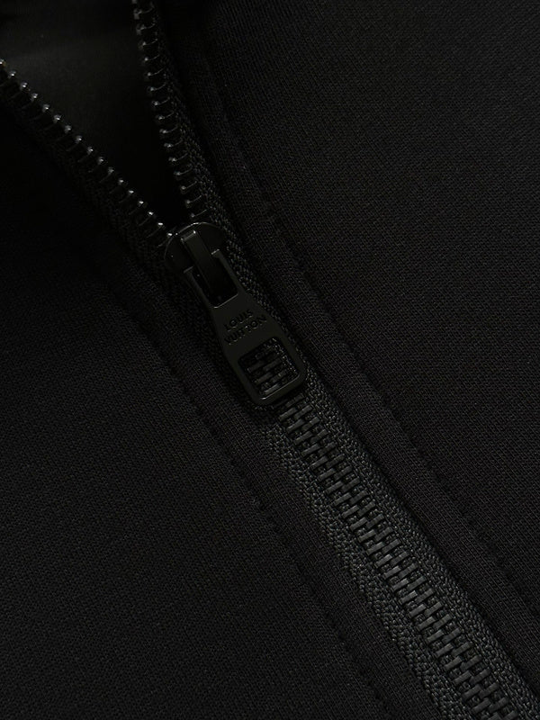 Full styled look of Louis Vuitton luxury clothing with label-forward styling