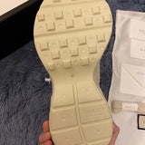 Side profile of Gucci stone beige sneakers classic court silhouette