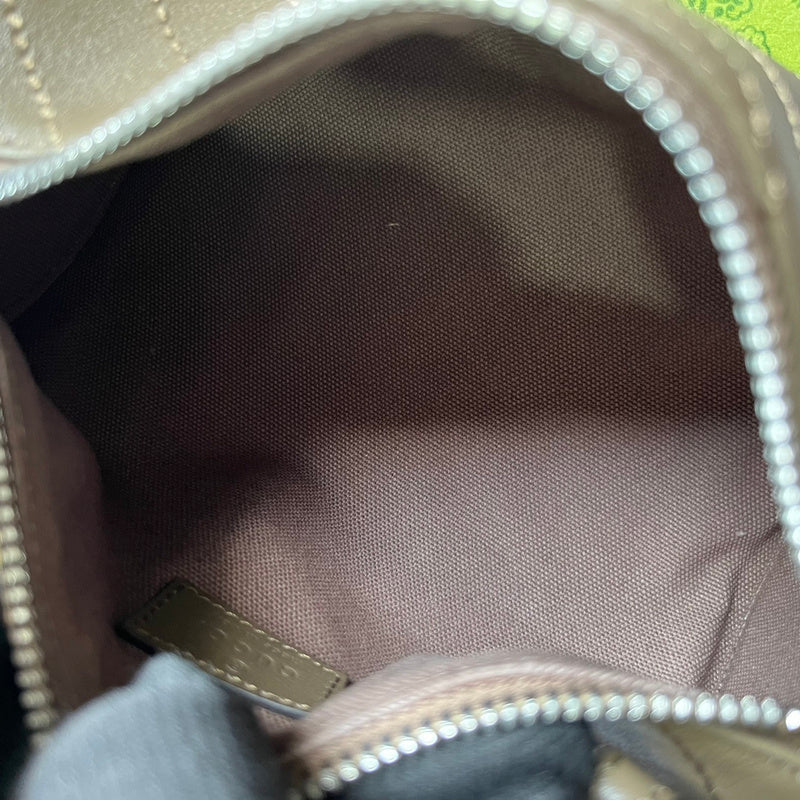 Close-up detail of structured classic women's handbag – women's luxury accessory