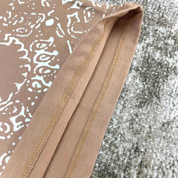 Three-quarter angle view of Amiri luxury piece style No.202