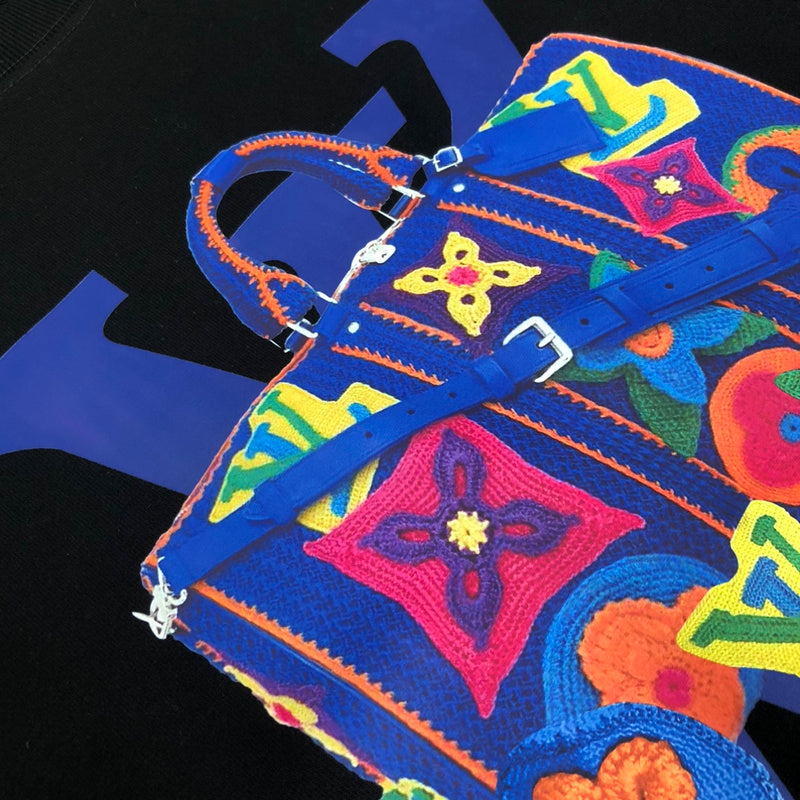 Front view of Louis Vuitton luxury clothing with signature branding