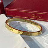 Angled view of Cartier unisex jewelry piece