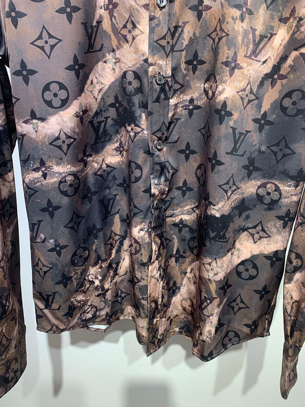 Flat lay presentation of Louis Vuitton cotton t-shirt with signature branding