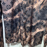 Flat lay presentation of Louis Vuitton cotton t-shirt with signature branding