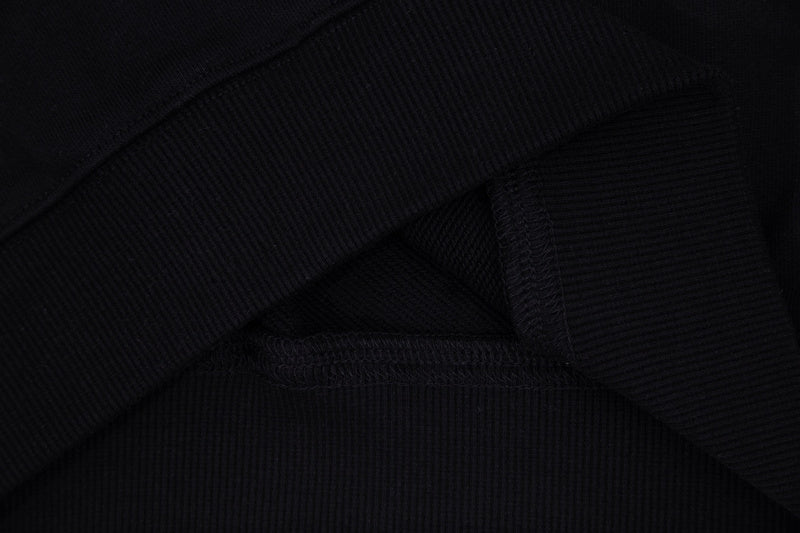 Side profile of Gucci luxury clothing with everyday silhouette