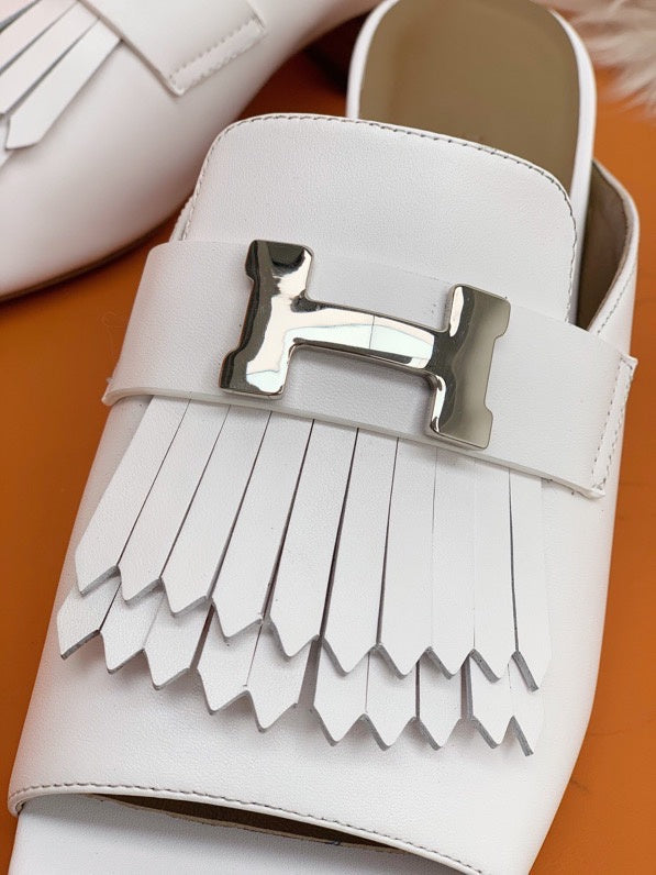 Hermès Burgundy High-Top Sneakers - Close-Up Texture View