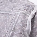 Side profile of Louis Vuitton luxury clothing with tailored silhouette