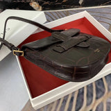 Styled lifestyle shot of structured statement women's handbag – women's designer-style accessory