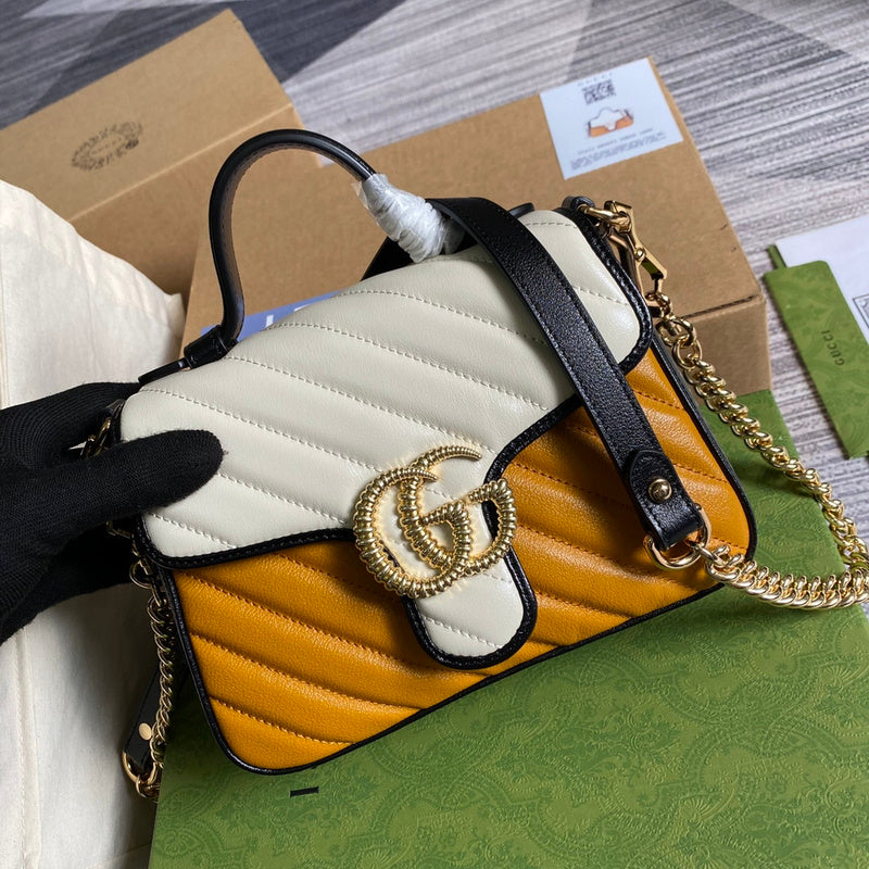 Back view of polished classic women's handbag – women's statement bag