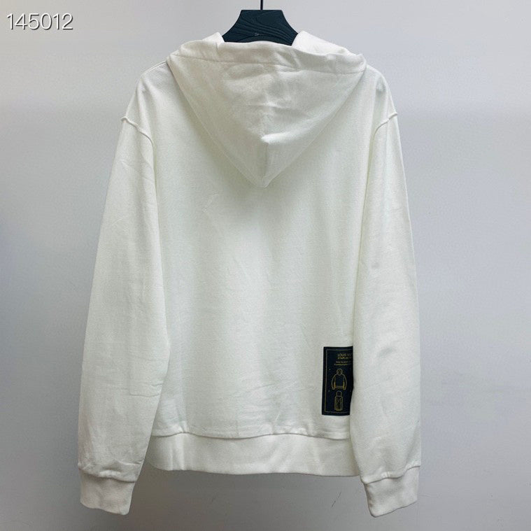 Flat lay presentation of Louis Vuitton luxury clothing with relaxed-fit cut