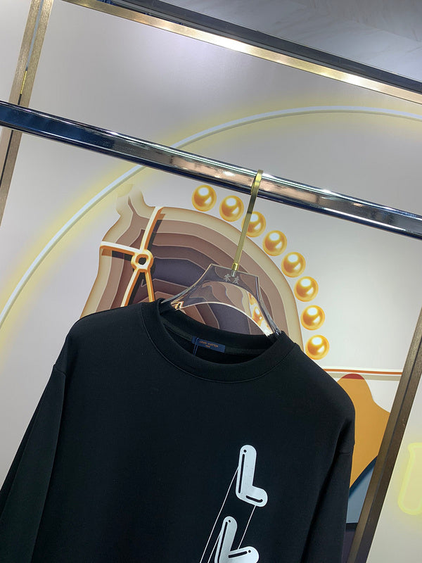 Close-up detail shot of Louis Vuitton luxury clothing with signature branding