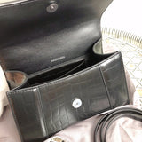 Side profile of polished chic women's handbag – women's statement bag