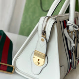 Styled lifestyle shot of statement polished women's handbag – women's everyday handbag