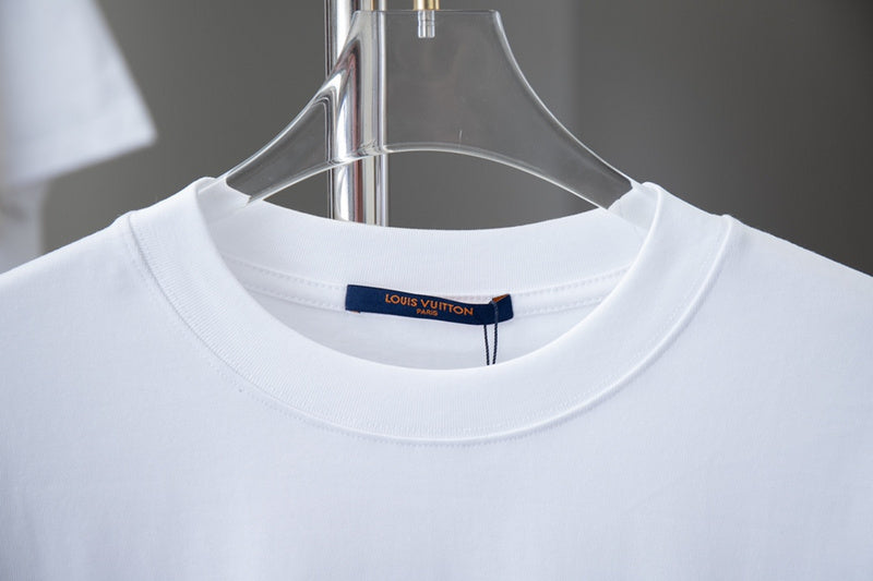 Close-up detail shot of Louis Vuitton cotton t-shirt with signature branding