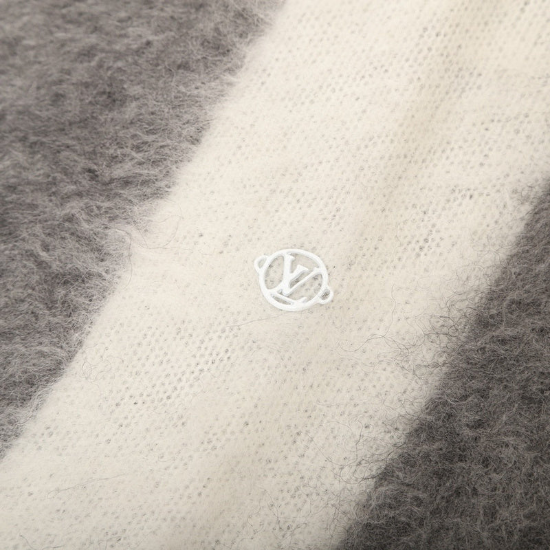 Side profile of Louis Vuitton luxury clothing with logo-detail design