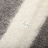 Side profile of Louis Vuitton luxury clothing with logo-detail design