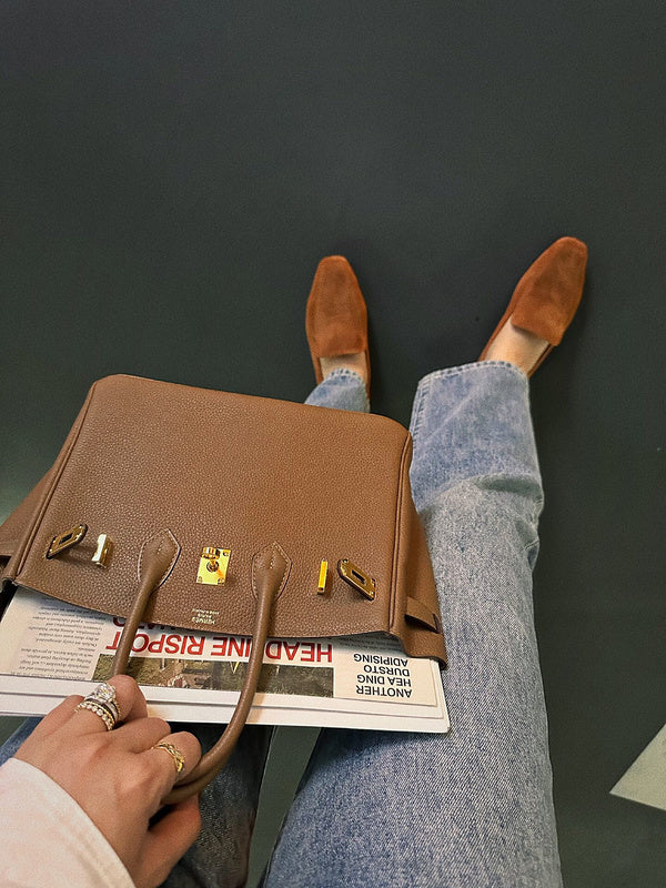 Side view of balanced structured handbag