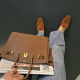 Side view of balanced structured handbag