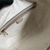 Close-up detail of classic chic women's handbag – women's designer-style accessory