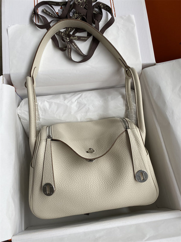 Side view of polished structured handbag