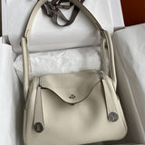 Side view of polished structured handbag