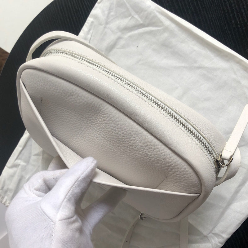 Close-up detail of everyday-luxe signature women's handbag – women's designer-style accessory