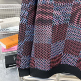 Back view of Louis Vuitton luxury clothing with label-forward styling
