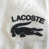 Back view of Lacoste luxury clothing with signature branding
