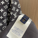 Close-up detail shot of Louis Vuitton cotton t-shirt with logo-detail design