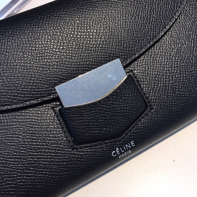 Side profile of premium polished women's handbag – women's designer-style accessory