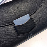 Side profile of premium polished women's handbag – women's designer-style accessory