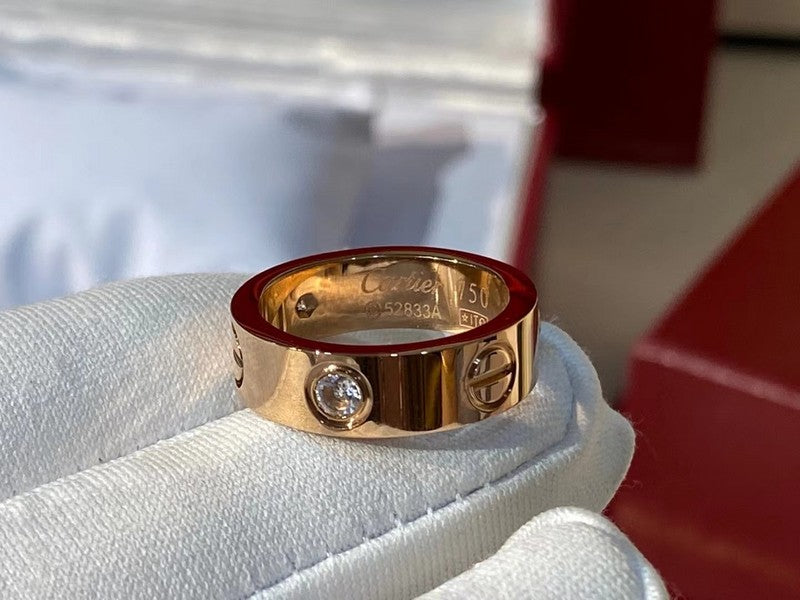 Close-up detail view of Cartier unisex jewelry piece