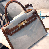 Side view of timeless structured handbag
