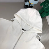 Close-up detail shot of Louis Vuitton luxury clothing with monogram-inspired silhouette