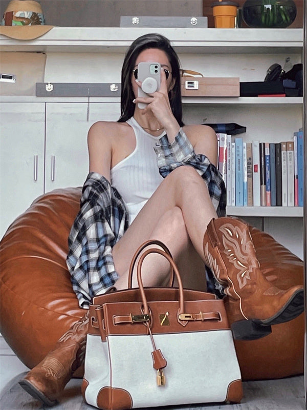 Polished crossbody bag carried on shoulder