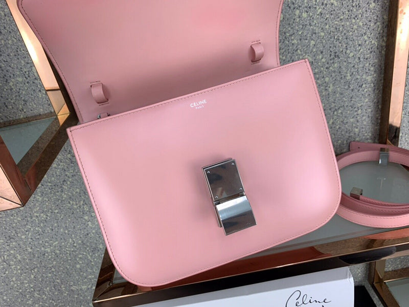 Handle and strap detail of modern structured women's handbag – women's statement bag