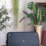 Sleek bag shown from front angle