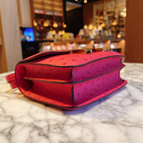 Side view of timeless structured handbag