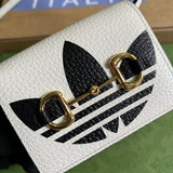 Side profile of polished statement women's handbag – women's statement bag