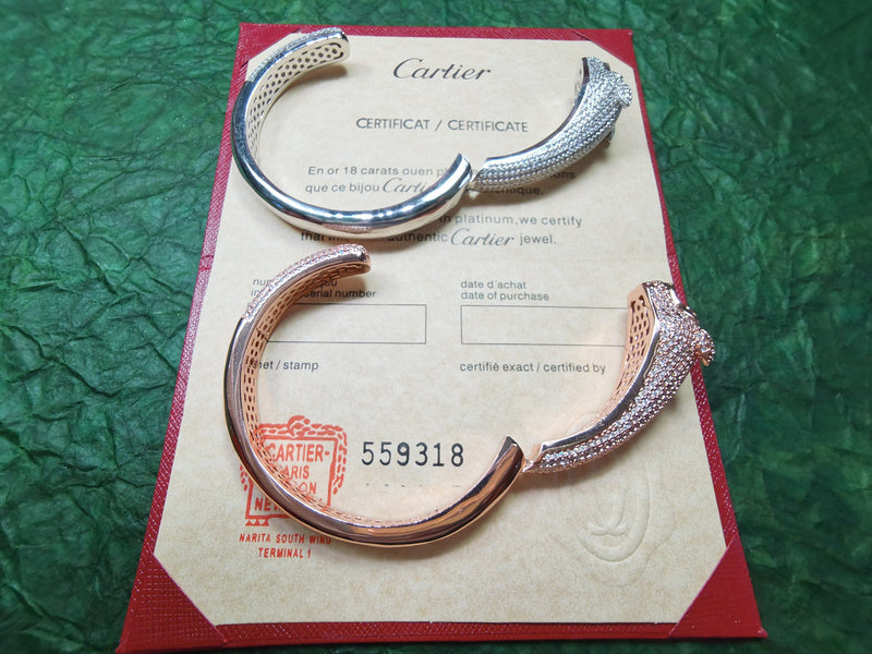 Side view of Cartier unisex jewelry piece