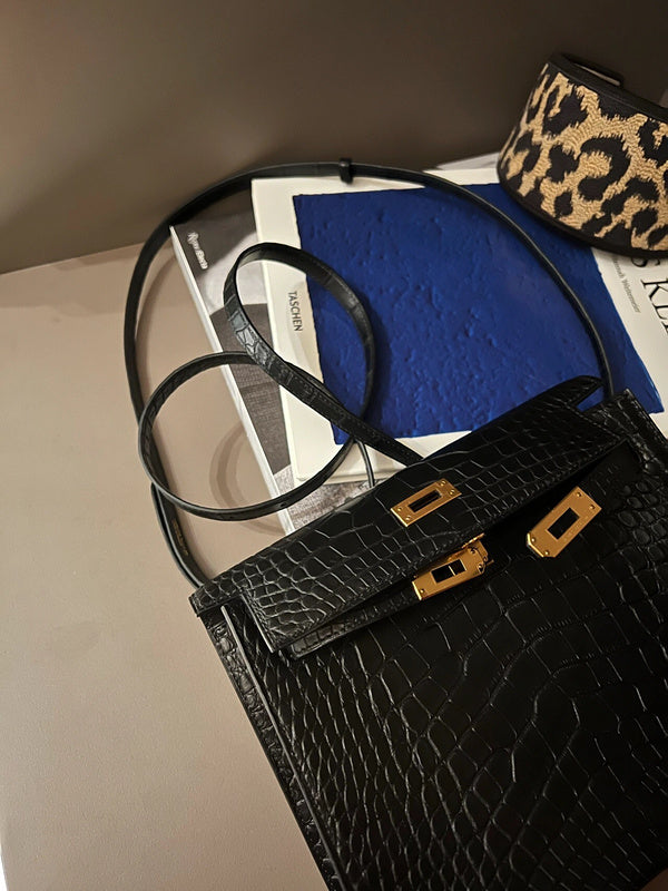 Side view of curated structured handbag