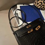 Side view of curated structured handbag