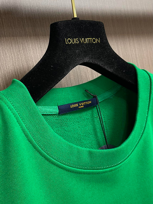 Front view of Louis Vuitton luxury clothing with tailored silhouette